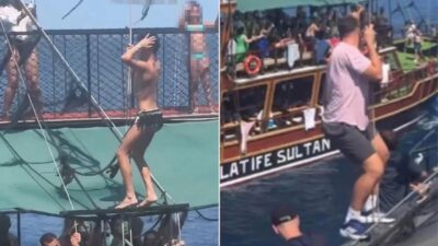 Marmaris'te düzenlenen tekne turlarında kaydedilen görüntüler, teknede kostümlü erkek dansçıların